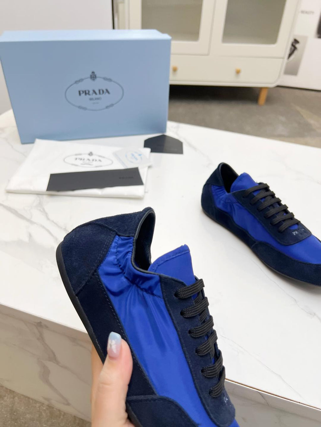 PRADA COLLAPSE SNEAKERS IN BLUE SUEDE AND NYLON