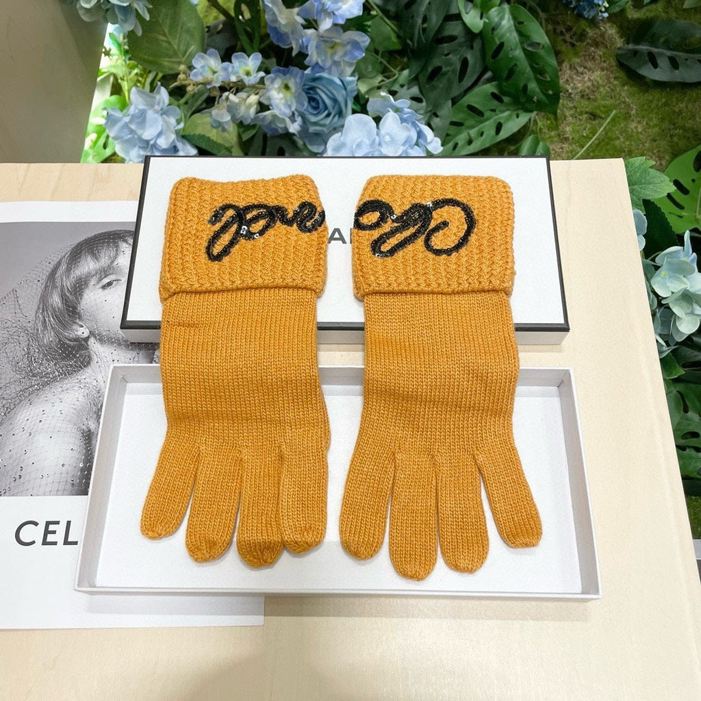CHANEL GLOVES IN MUSTARD YELLOW WOOL WITH BLACK LOGO 465776