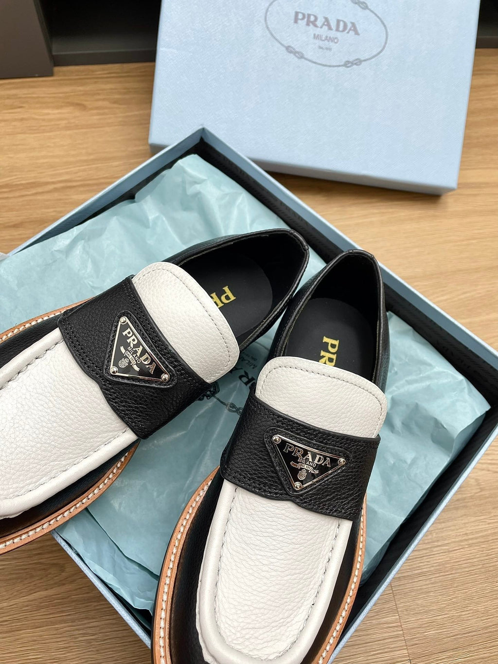 PRADA CHOCOLATE LOAFERS BLACK AND WHITE CALFSKIN
