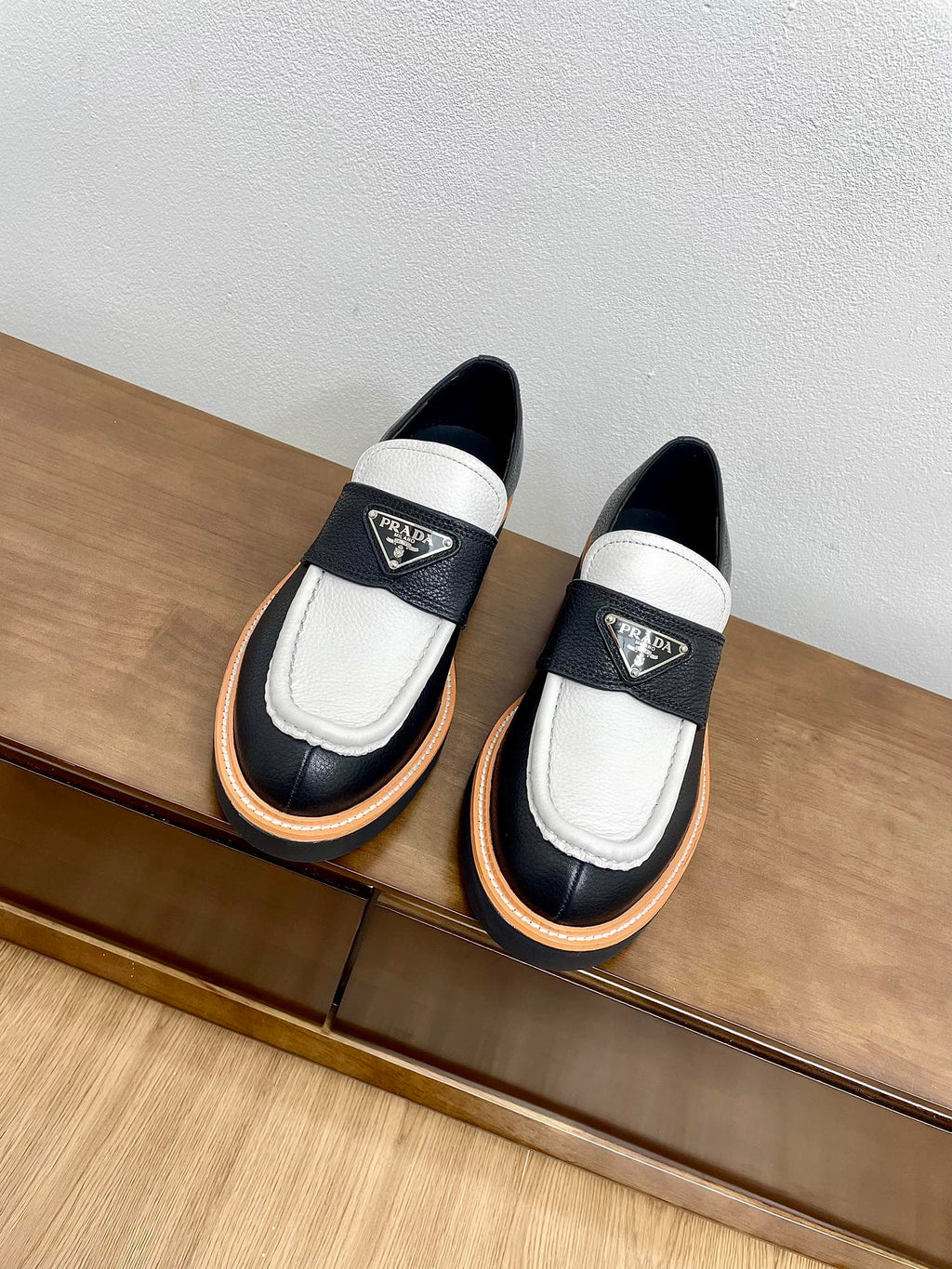 PRADA CHOCOLATE LOAFERS BLACK AND WHITE CALFSKIN