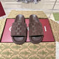 GUCCI SLIDES IN DARK BROWN SUEDE WITH EMBOSSED LOGO STYLE 1