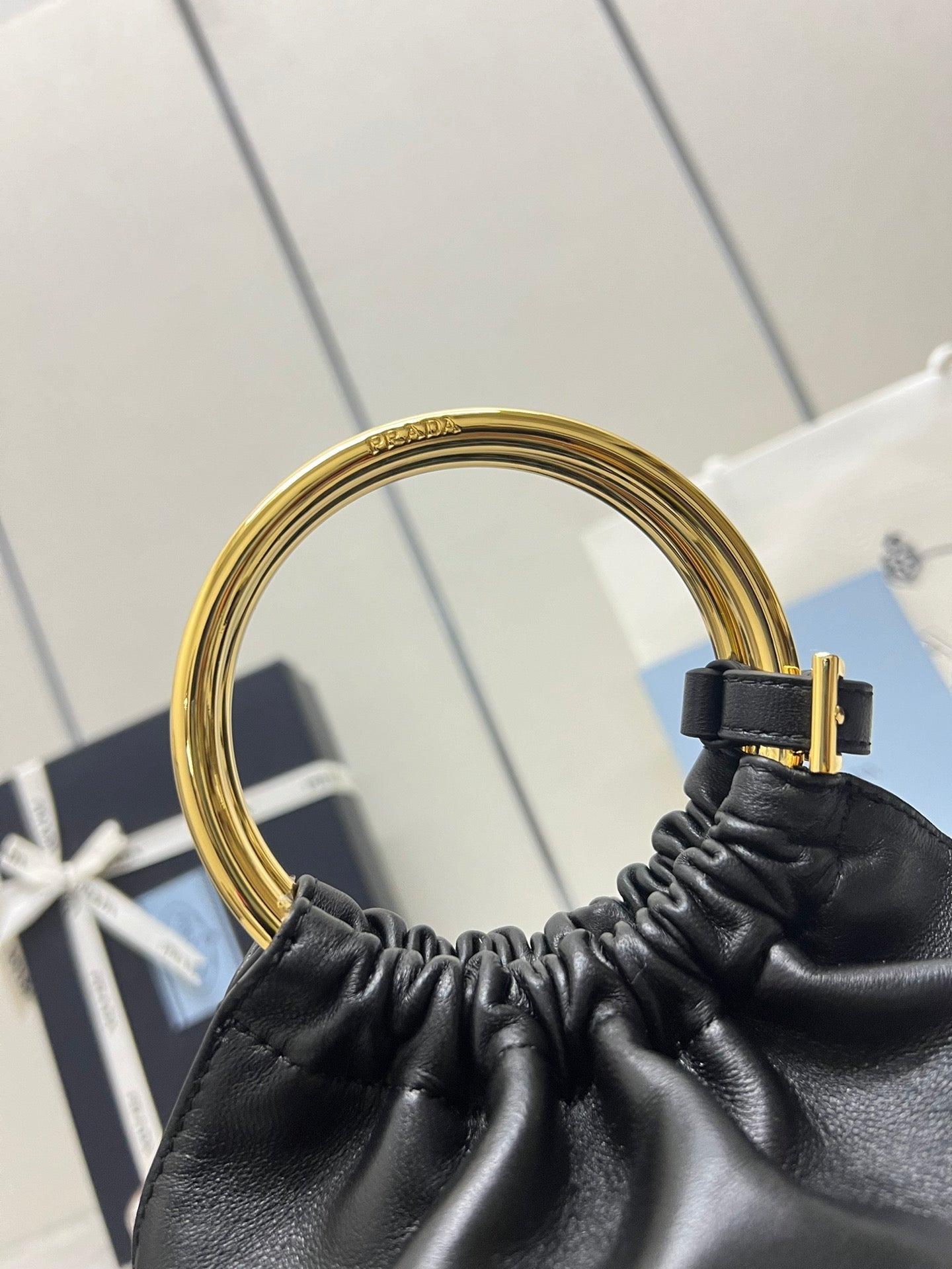 PRADA MINI BUCKET BAG 19 IN BLACK SOFT NAPPA LAMBSKIN GOLD HARDWARE