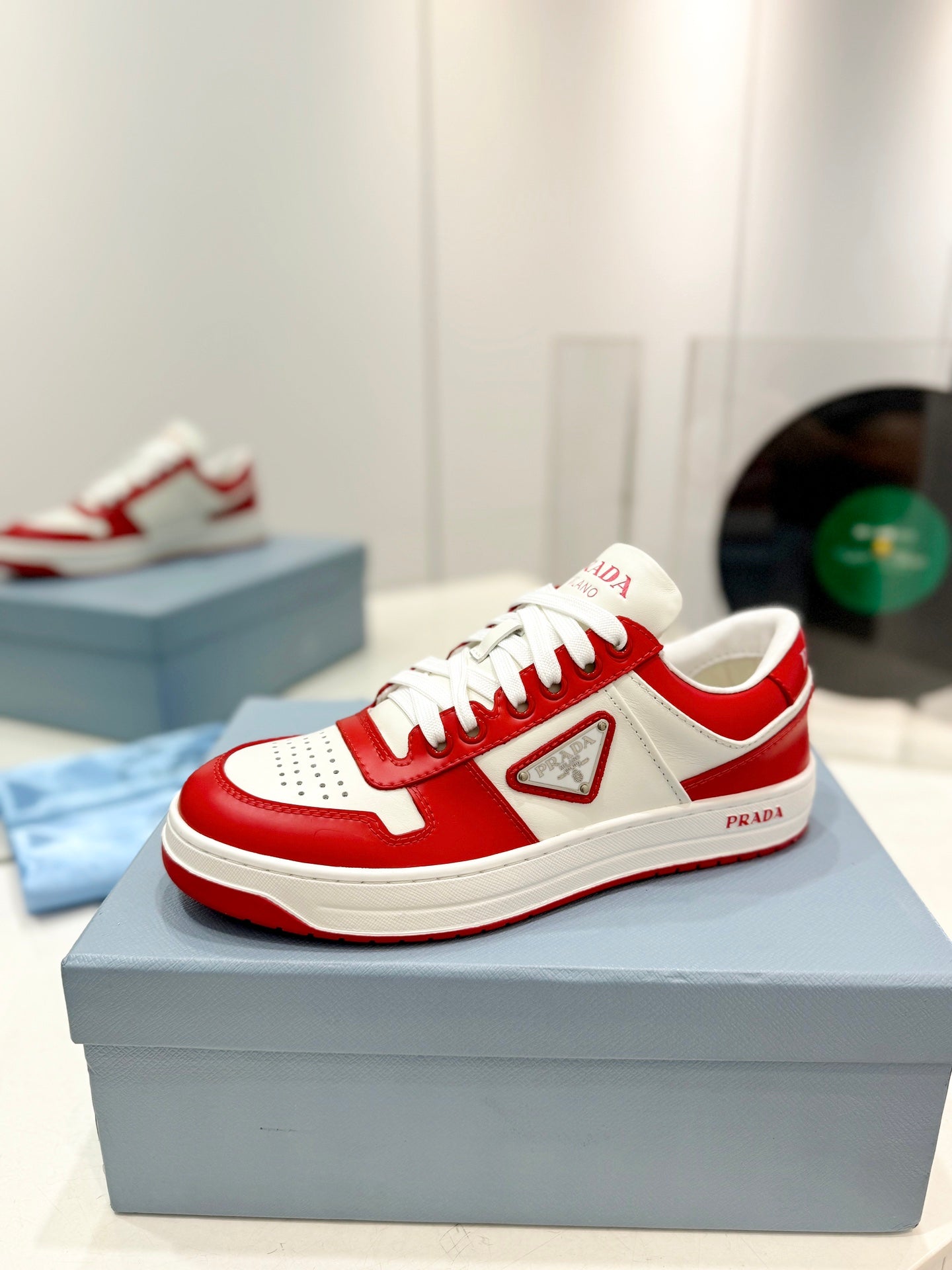 PRADA DOWNTOWN PERFORATED SNEAKERS WHITE AND RED CALFSKIN