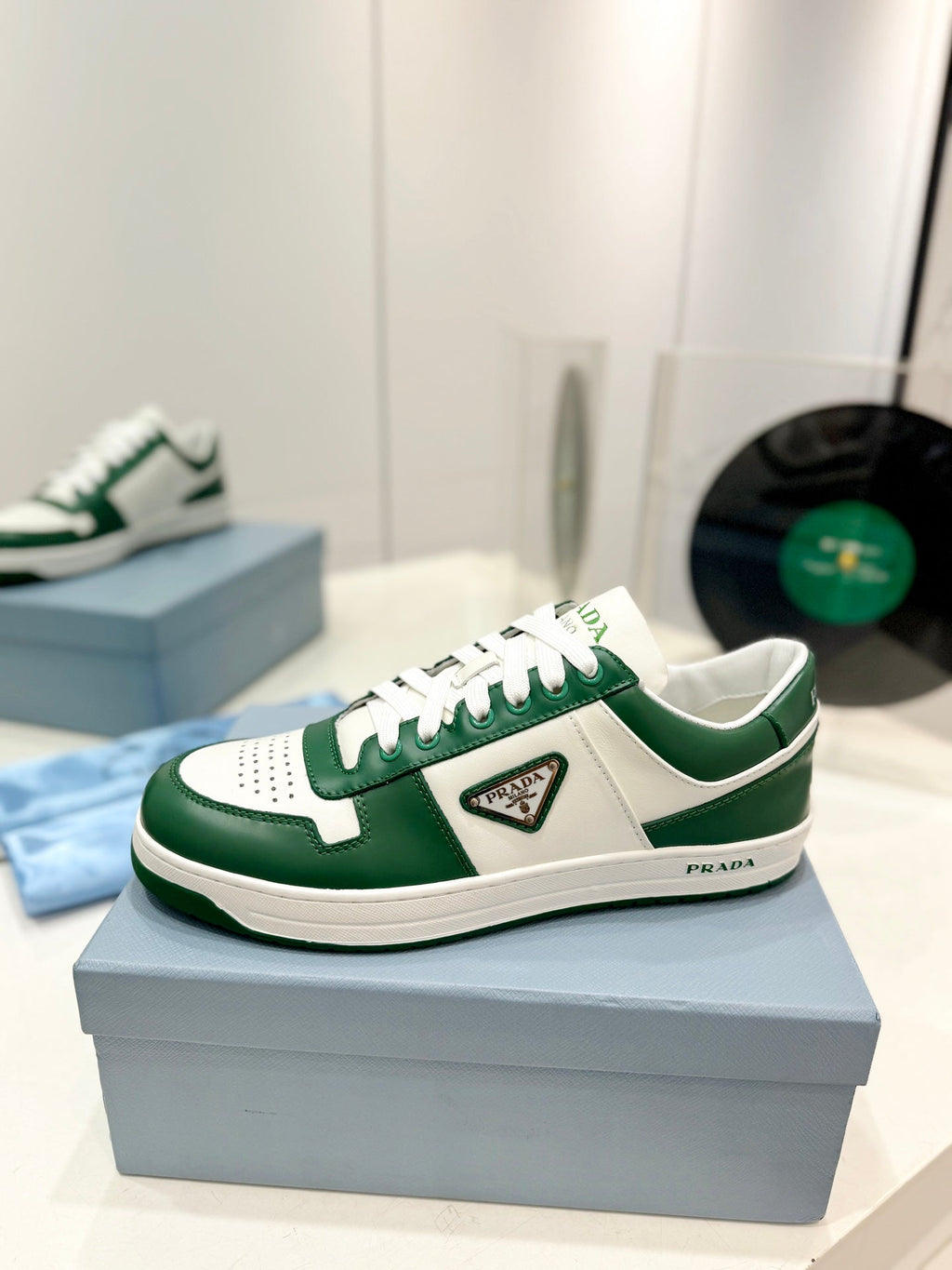 PRADA DOWNTOWN PERFORATED SNEAKERS WHITE AND GREEN CALFSKIN