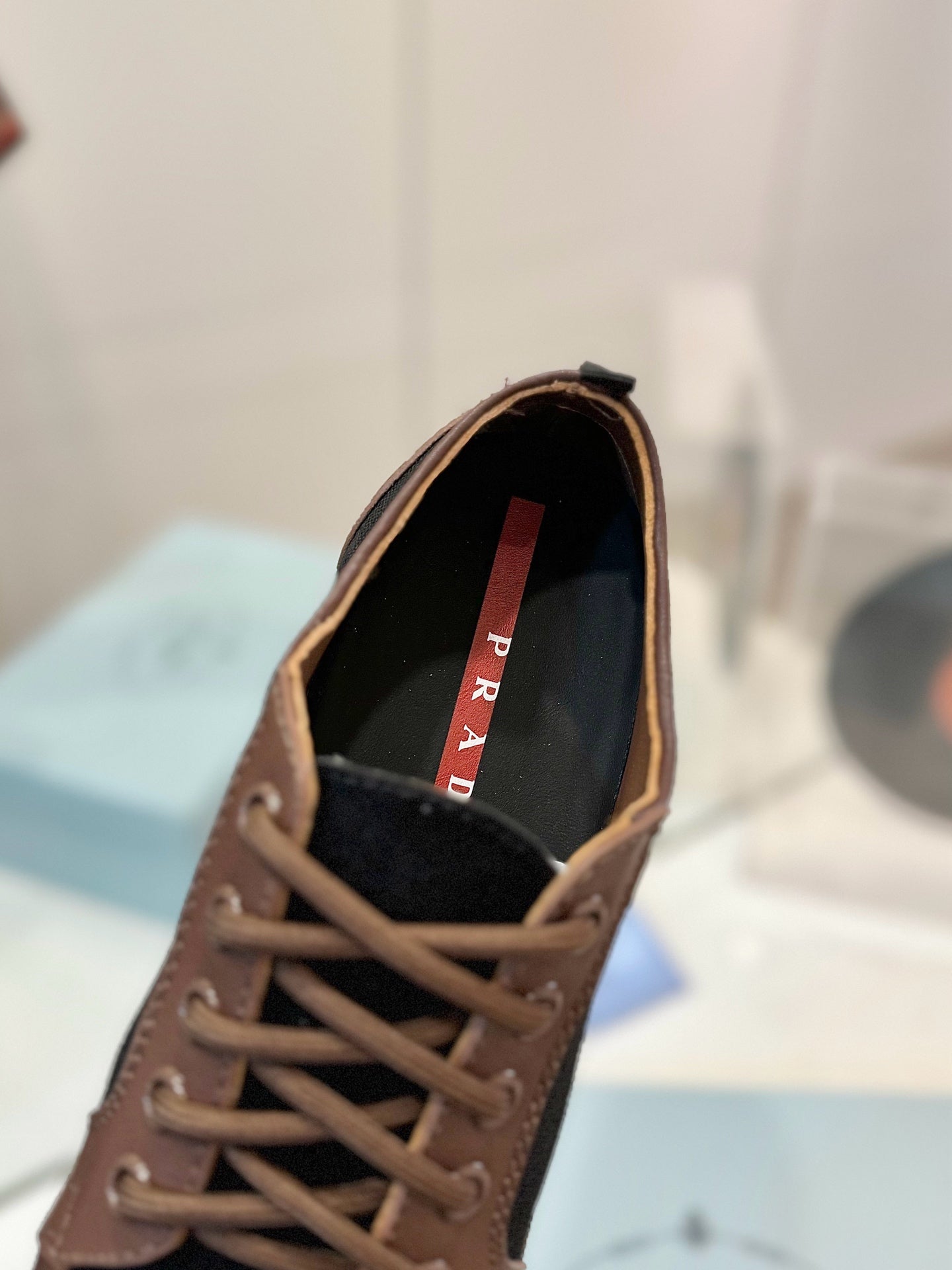 PRADA SNEAKERS IN BROWN LAMBSKIN AND BLACK CANVAS