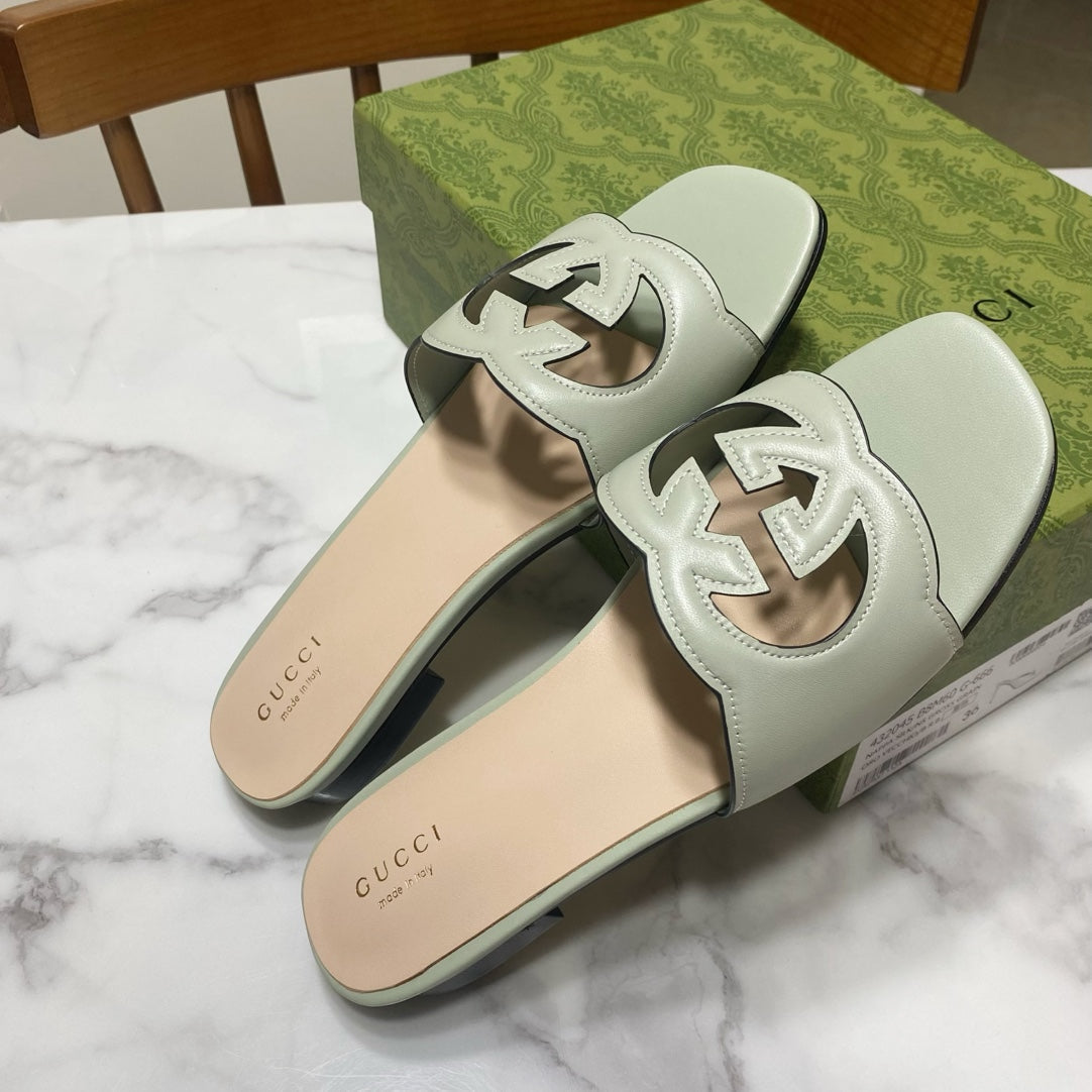 GUCCI INTERLOCKING G SLIDE SANDAL IN PASTEL GREEN AND BEIGE CALFSKIN