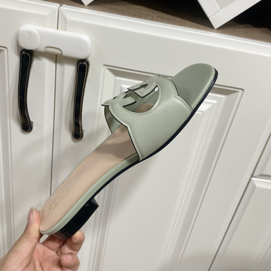 GUCCI INTERLOCKING G SLIDE SANDAL IN PASTEL GREEN AND BEIGE CALFSKIN
