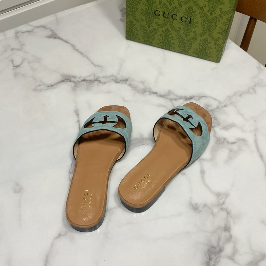 GUCCI INTERLOCKING G SLIDE SANDAL IN MORNING BLUE SUEDE AND BROWN SHEEPSKIN LINING