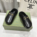 GUCCI HORSEBIT MULE IN BLACK CALFSKIN AND FLEECE LINING